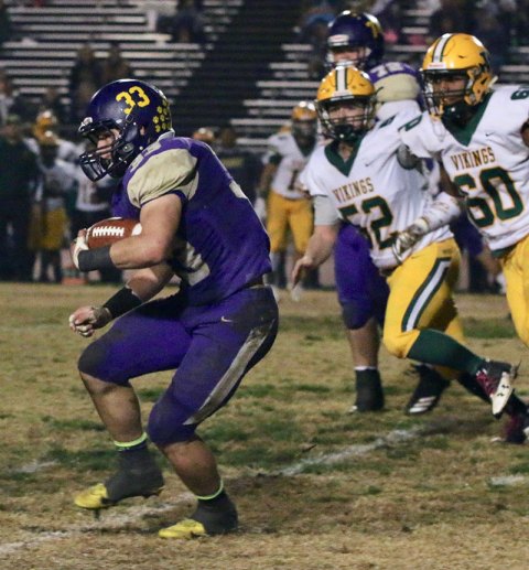 Lemoore's William Kloster runs for yardage in Friday night's big win over visiting West Bakersfield High School.